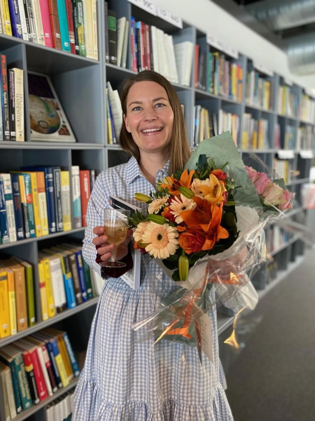 Photo of Ada Johanne Ellingsrud holding flowers