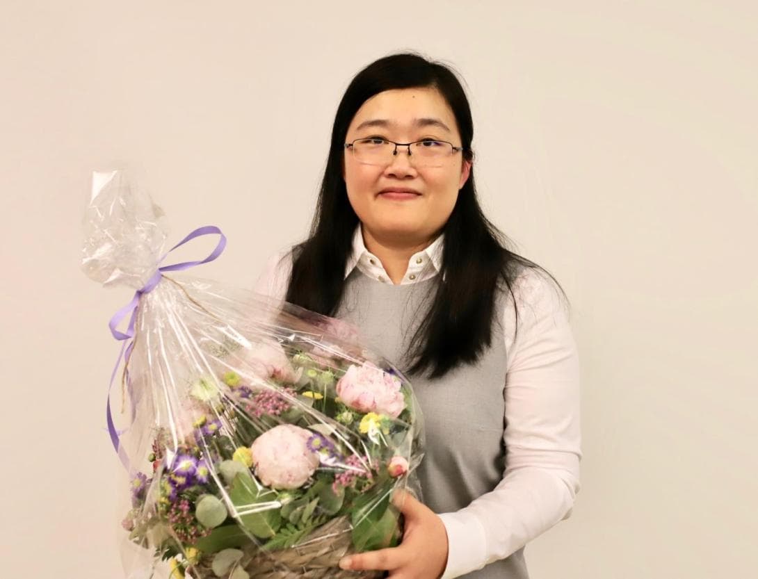 Man Zhang defended her PhD