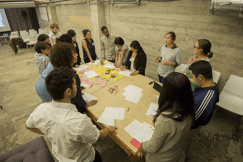 Jessica Menold teaches a group of students