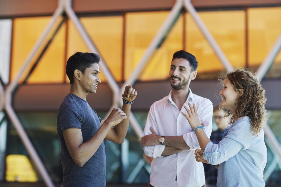 A group of interns talking
