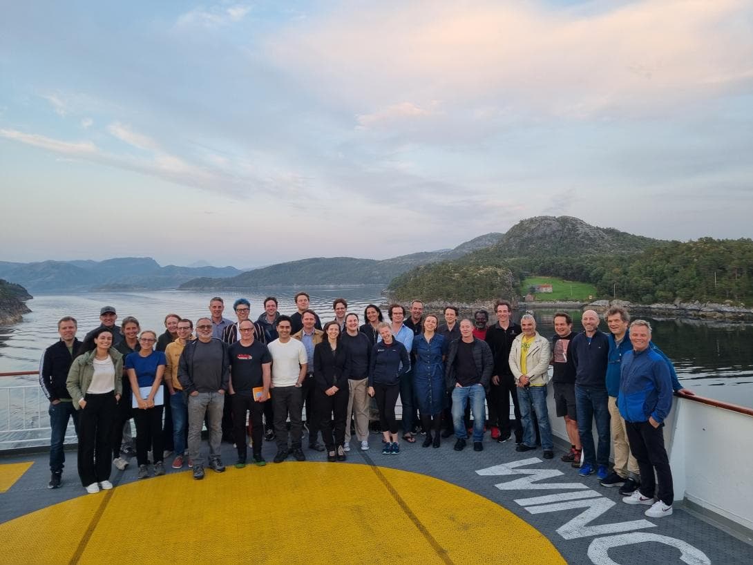 A group photo of the participants in the workshop, aboard Hurtigruten. 