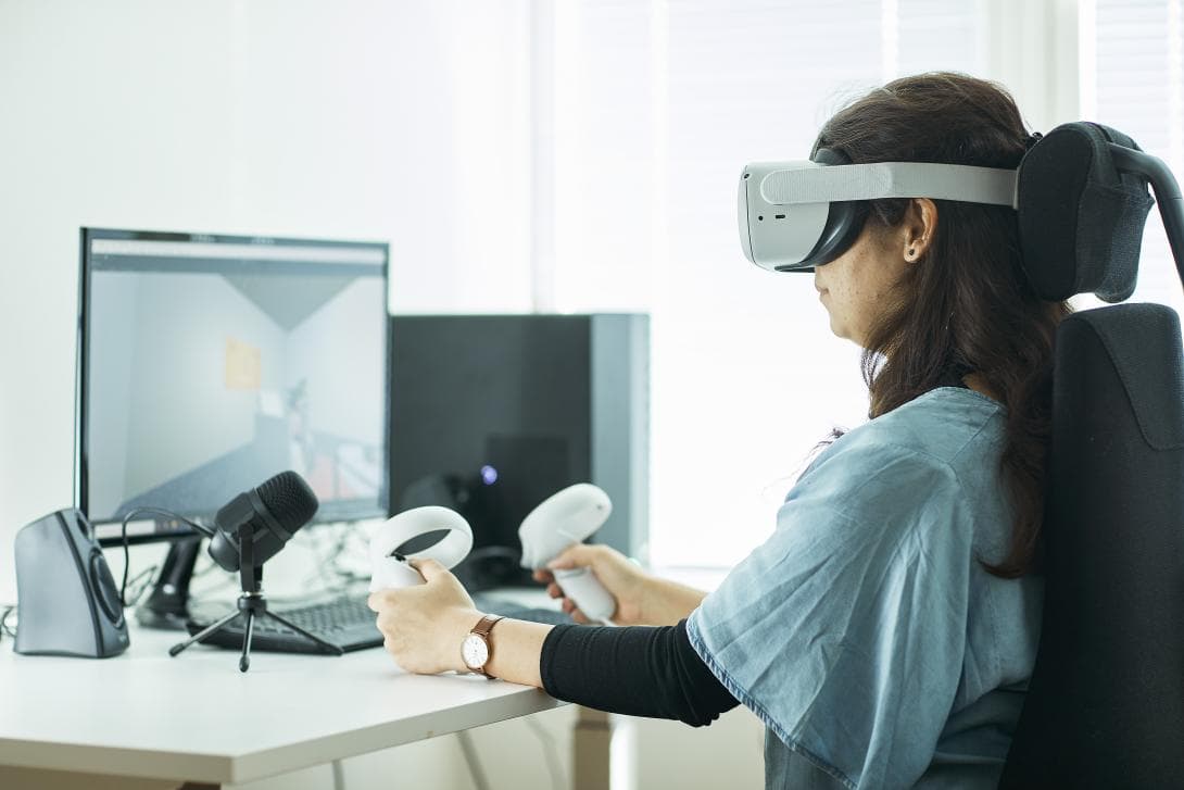 Researcher testing VR
