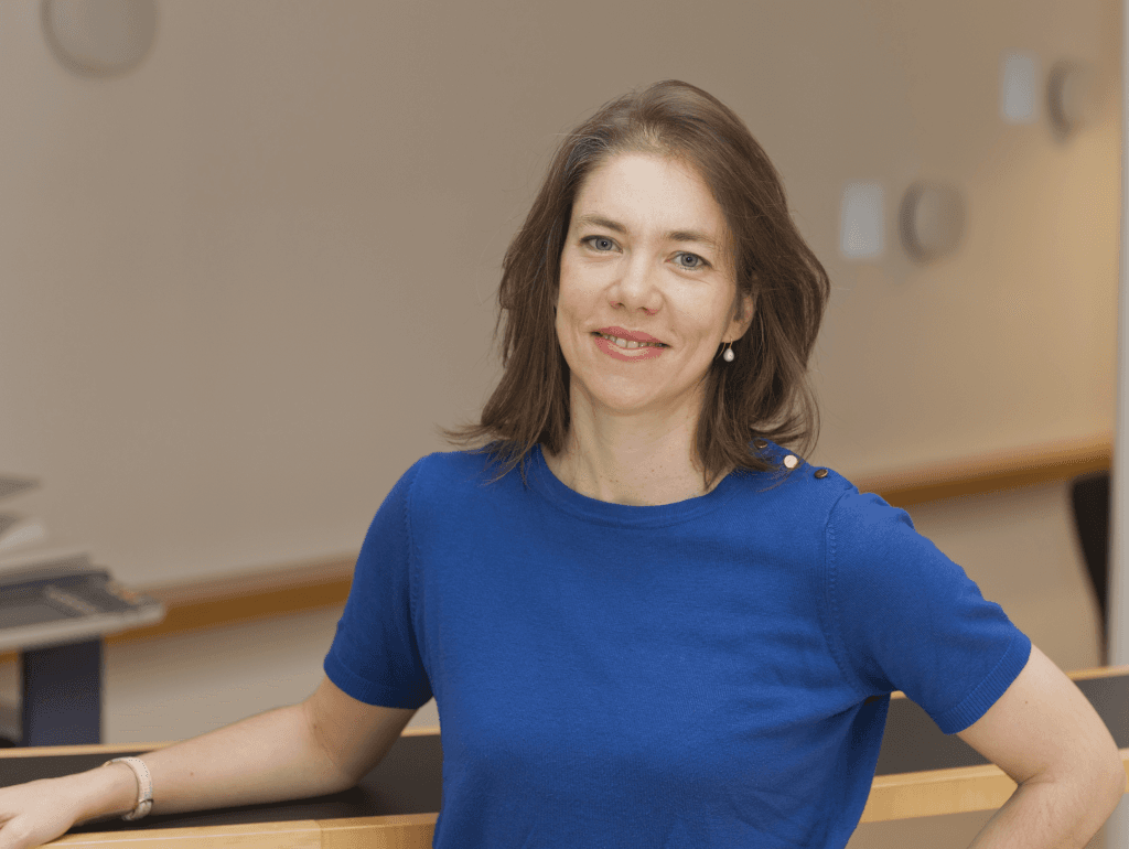 Female guest lecturer in front of podium