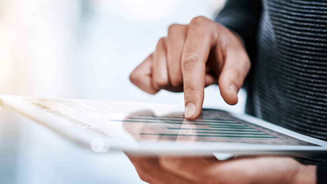 Person touching a notepad