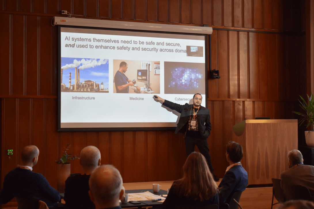 Picture from a networking event with Digital Norway, where Michael Riegler presents on AI security.